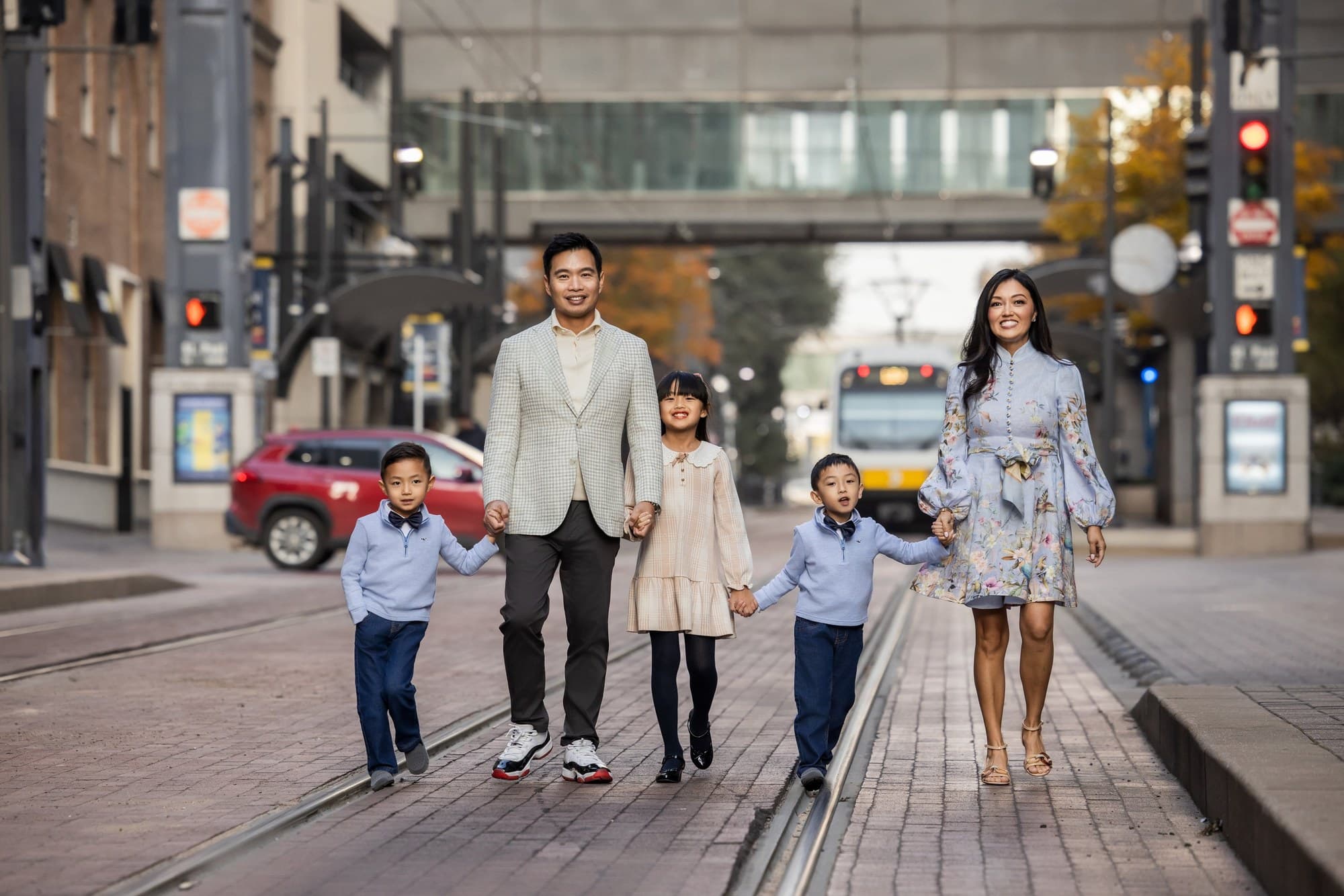 The Lam family walking together in downtown Dallas